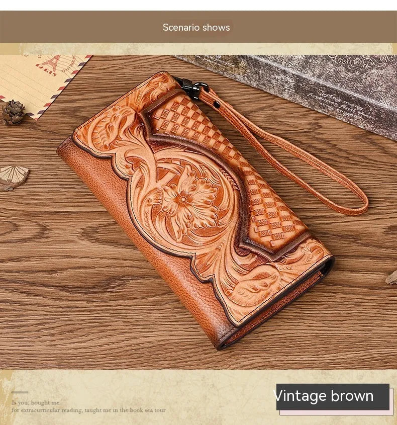 Women's brown embossed floral pattern tri-fold cowhide leather wallet showing interior compartments
