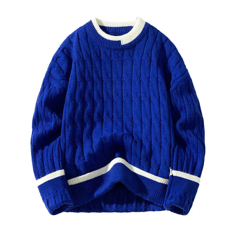Man wearing a loose-fit, light blue, long sleeve two-piece acrylic sweater set
