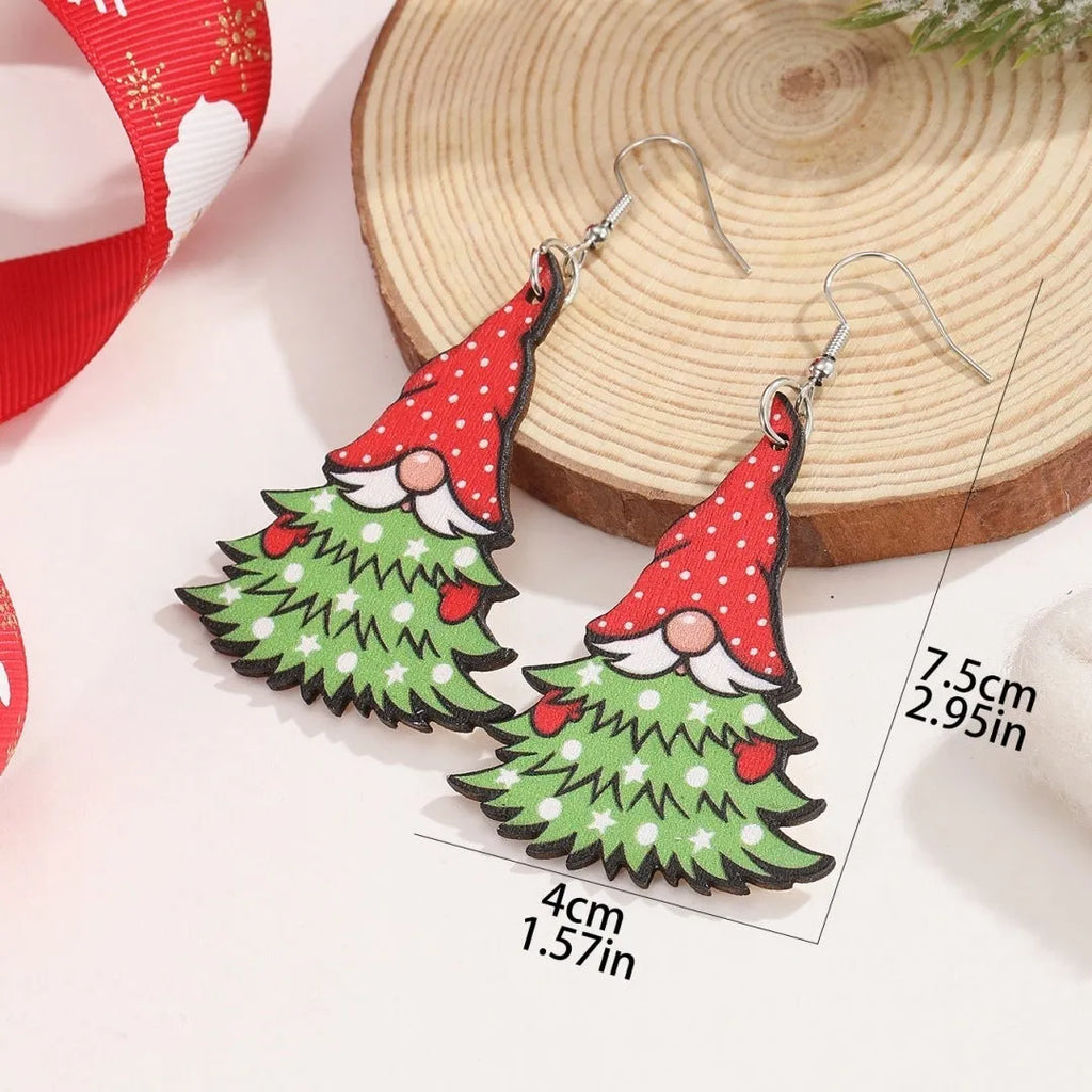 Wooden Christmas earrings with printed geometric designs featuring Santa Claus elements
