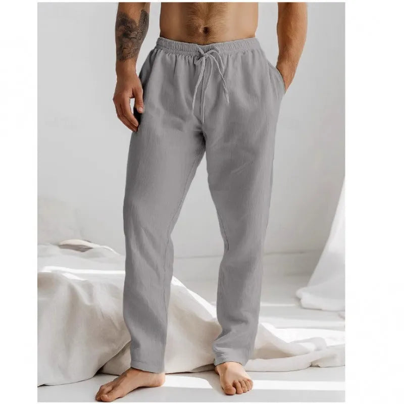 Men's loose fit summer trousers in light blue with elastic waistband and straight leg opening