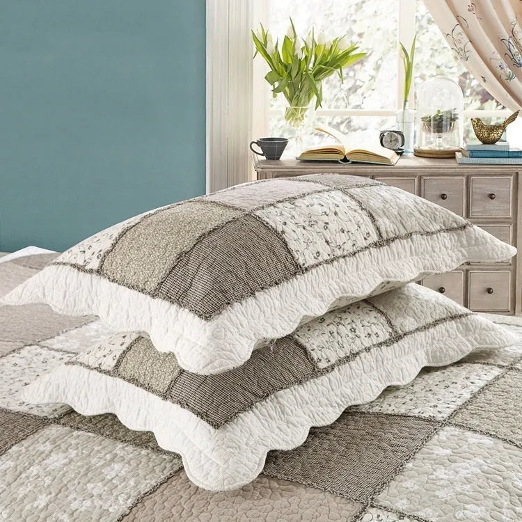 Pure cotton quilted bedspread three-piece set with pillowcases on a bed