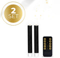 Set of four tall black LED taper candles with realistic orange 3D flickering flames