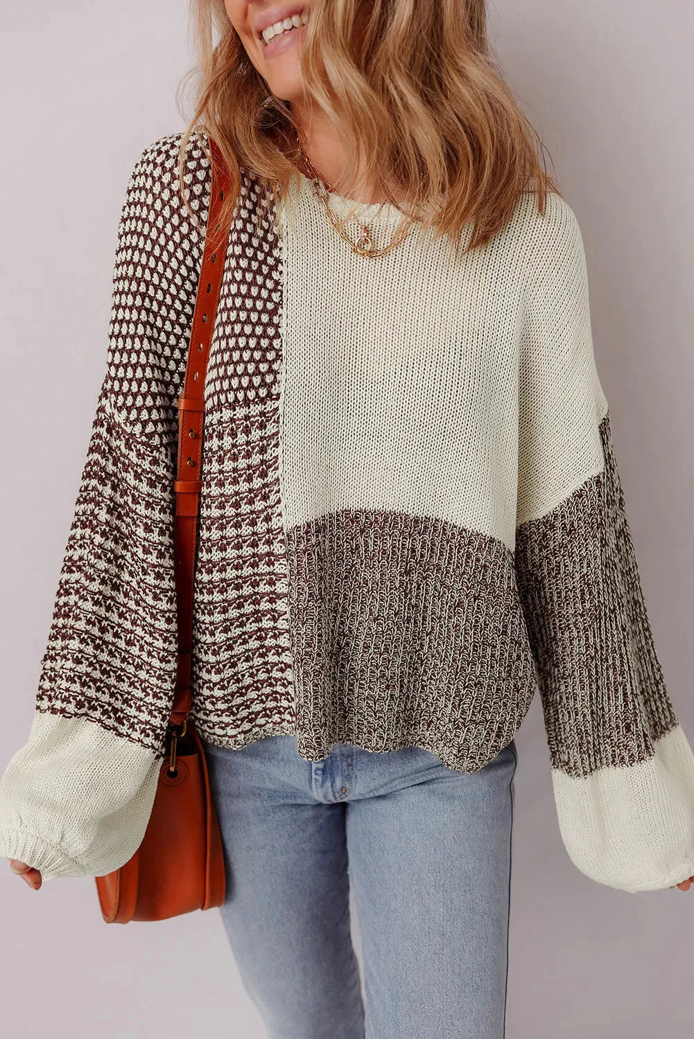 Dark khaki colour block women's loose knit sweater with drop shoulders and a back tie fastening.