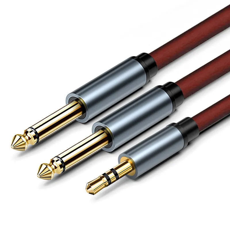 3.5mm to two 6.5mm male audio splitter cable on a black background