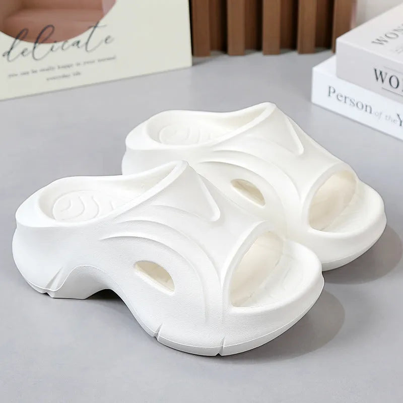 Women's white thick-soled EVA slippers with round toe design for beach use