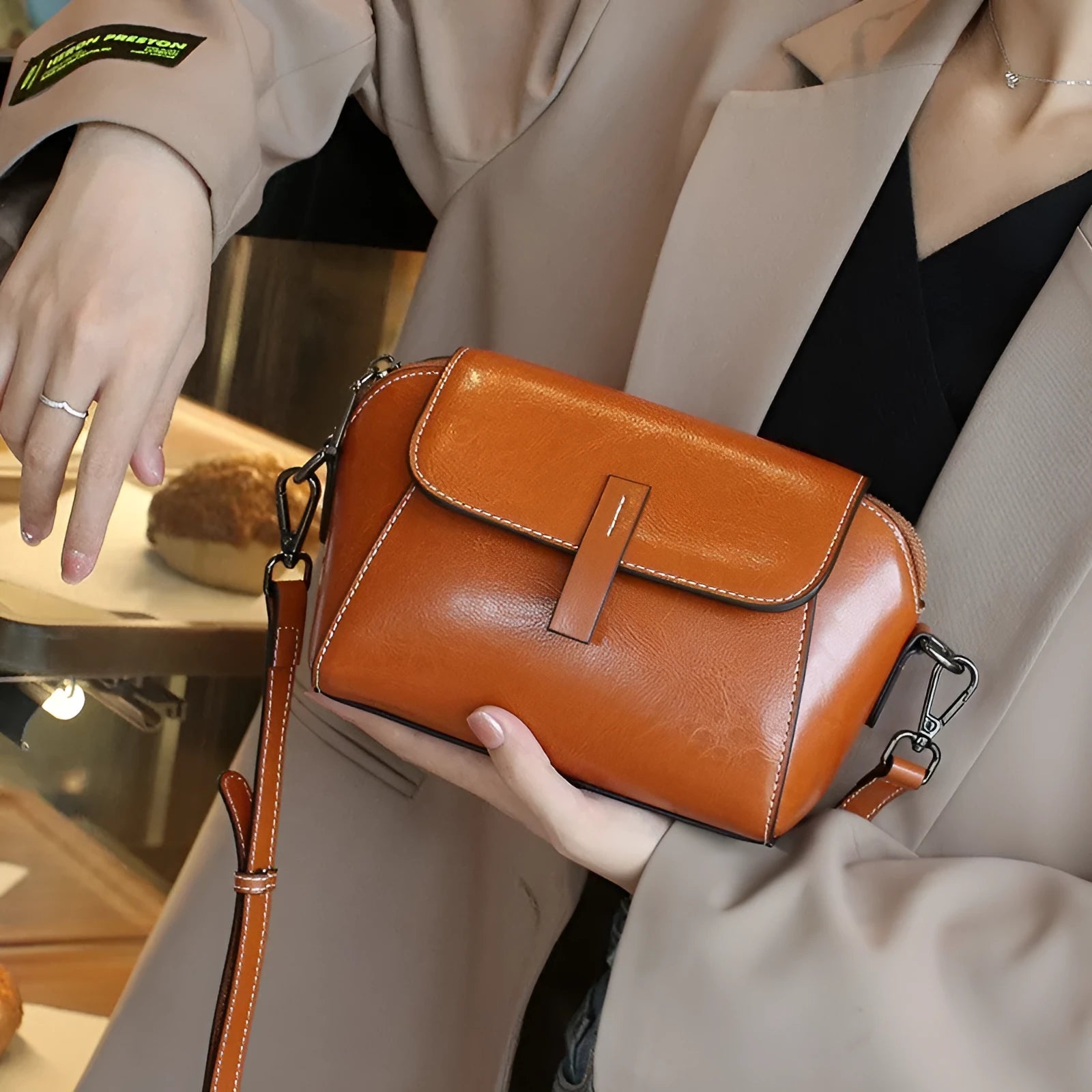 Women's oil wax cowhide shell messenger bag with single shoulder strap and zipper pockets in Avocado Green, Black, Brown, Coffee, Peacock Blue, or Pearl White