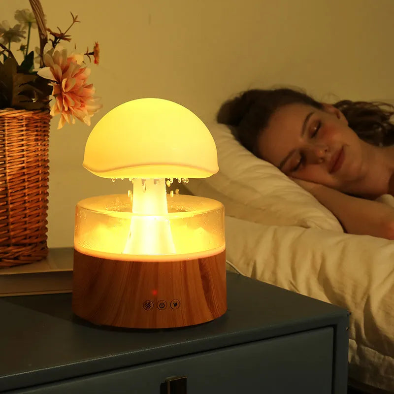 White cloud-shaped humidifier with raindrop simulation and seven-colour lighting, 500ml capacity