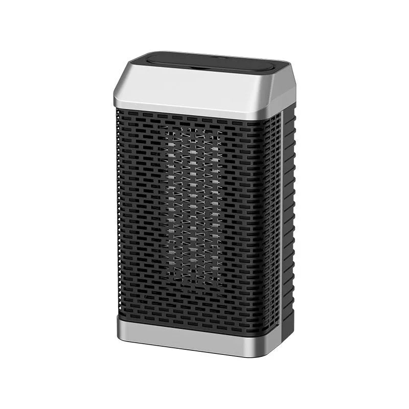Black remote control desktop electric heater on a desk