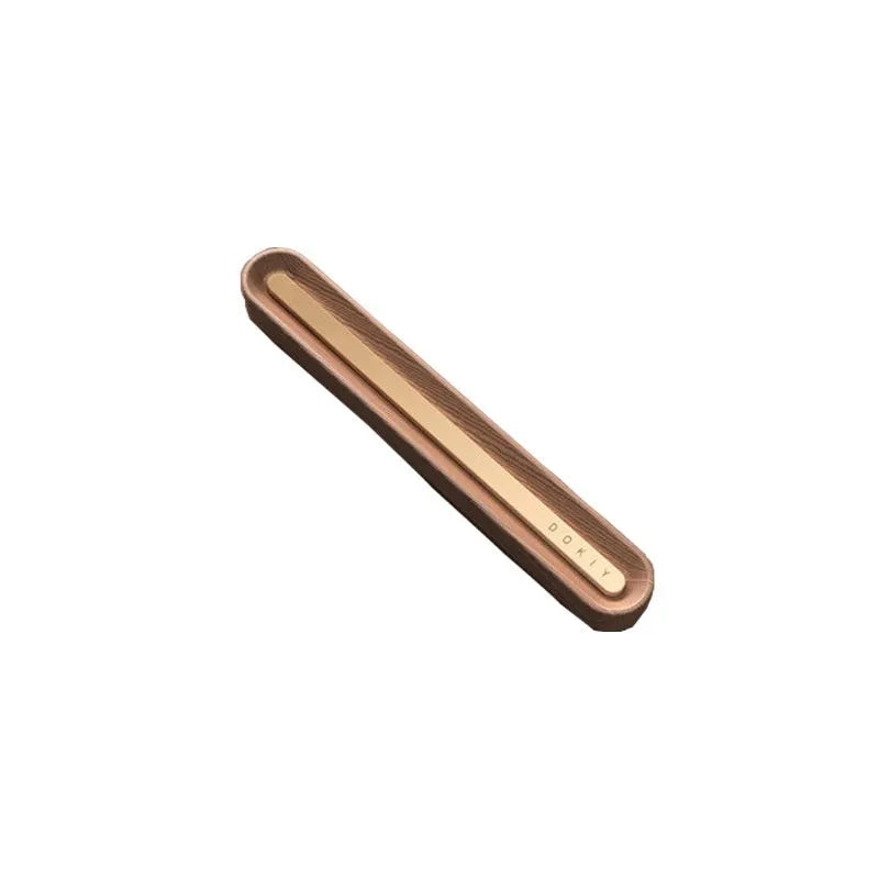 Long strip car aromatherapy ornament in walnut colour, shown clipped to a car air vent.