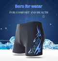 Men's patterned swimming trunks in plus sizes with fire design on black background