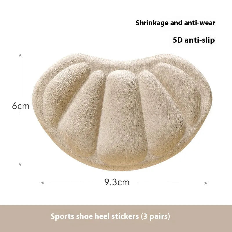 Camel coloured suede heel cushion pads with adhesive backing, measuring 9.3 x 6 cm