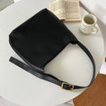 Soft PU leather ladies shoulder bag with swing threads in black or brown