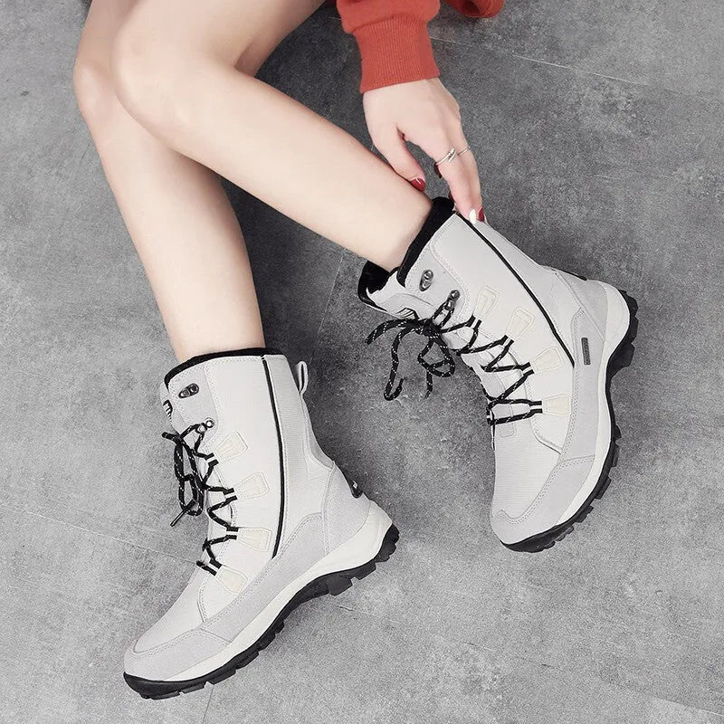 Women's black genuine leather mid-calf thermal snow boots with round toe and rubber sole