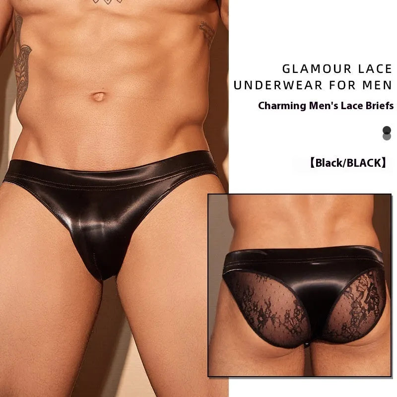 Men's black and white shark skin lace polyester briefs shown laid flat.