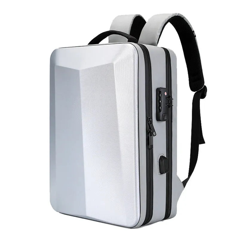 Black waterproof business backpack for 17-inch laptop with curved shoulder straps on a grey background.