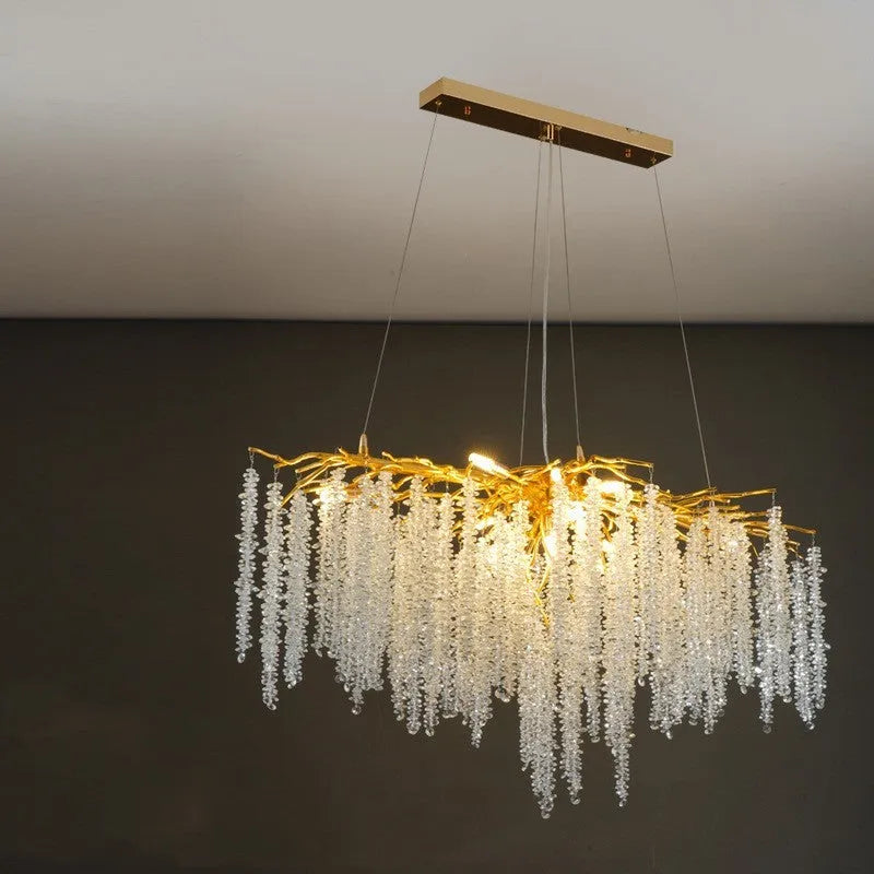 Crystal chandelier light with adjustable height, shown in a light luxury style with aluminium alloy body.