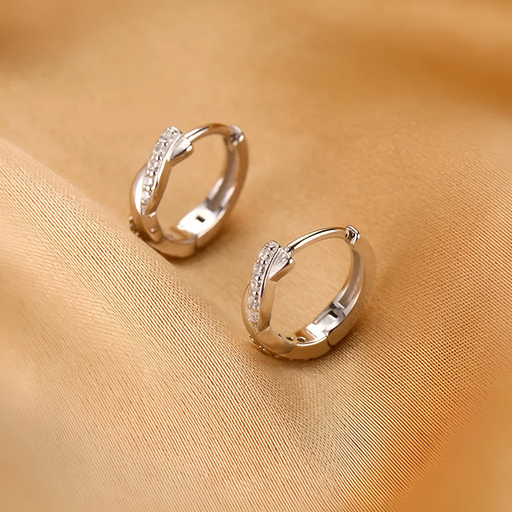 Geometric hemp rope earclip earrings with interwoven copper in gold and silver colours