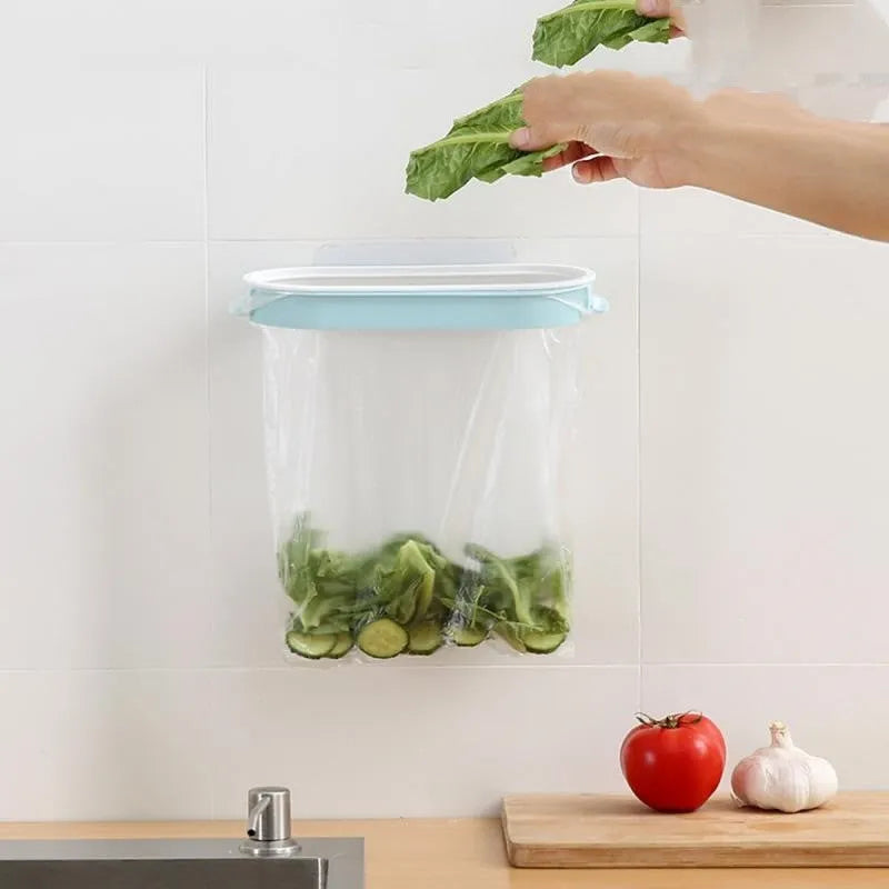 Plastic kitchen garbage bag storage rack in blue or pink for cabinet organisation