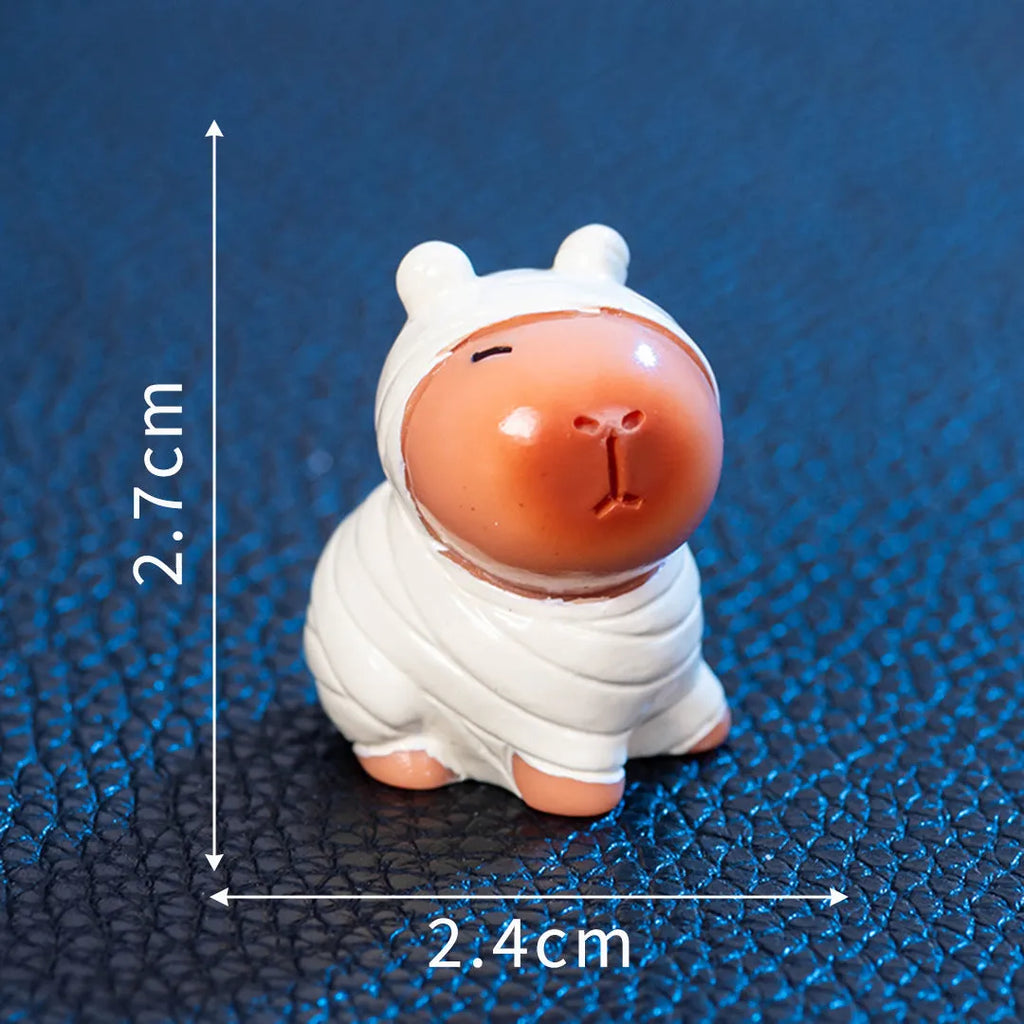 Capybara-shaped Halloween resin decorations showing eight different character designs