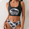 Women's coconut print bikini swimsuit with lace-up back design on hanger