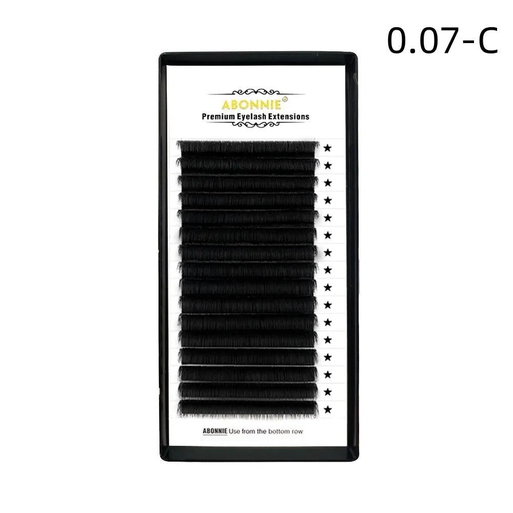 Close-up of dense 16-row false eyelashes with matte wool texture in mink hair, showing length options.