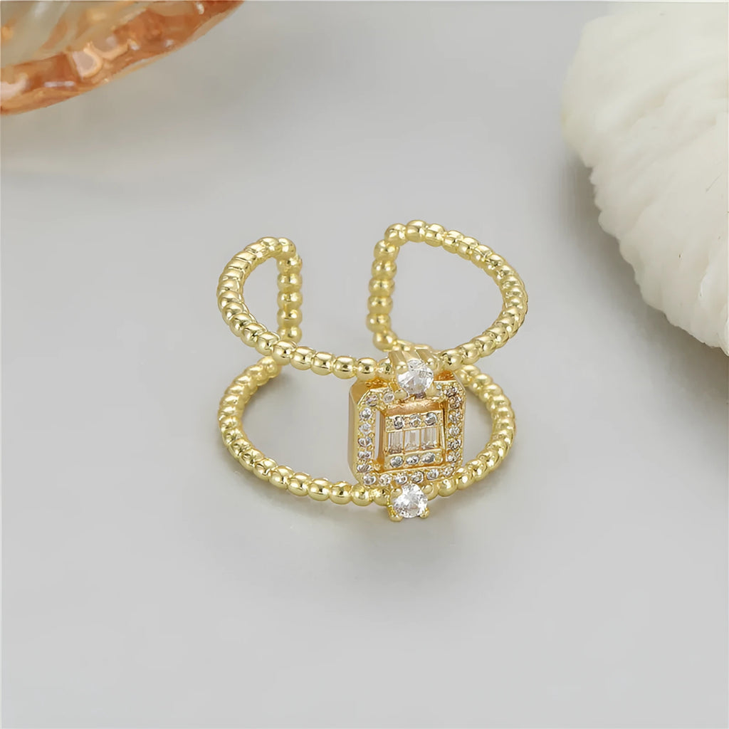 U-shaped open ring with adjustable opening in 14K gold plating over copper, asymmetric design