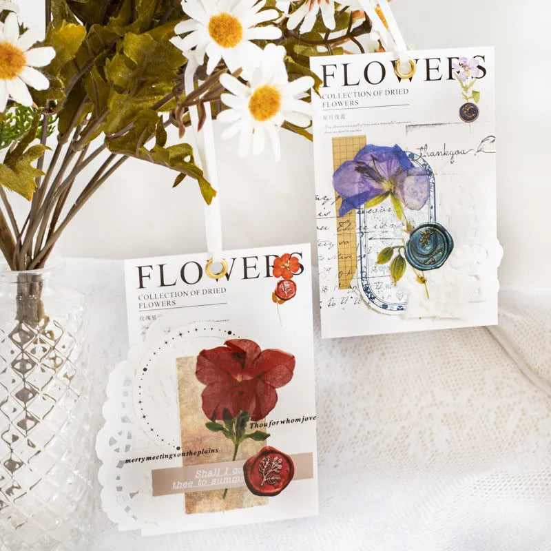 Eight styles of dried flower journal stickers in Dark Night Purple, rose nebula and other colours at 70mm size