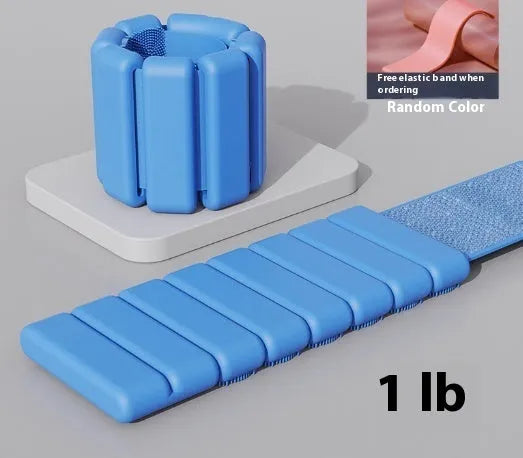 Silicone fitness weight bracelet with Velcro strap shown in black, blue, grey, or pink.
