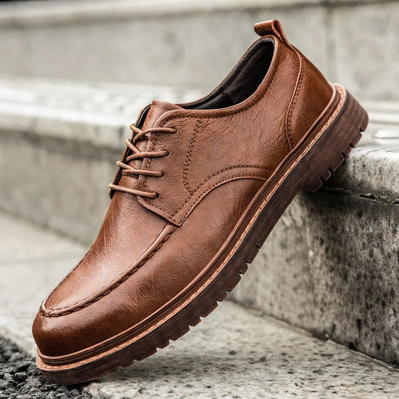 Men's casual leather shoes in black or brown with round toe and sewing line details
