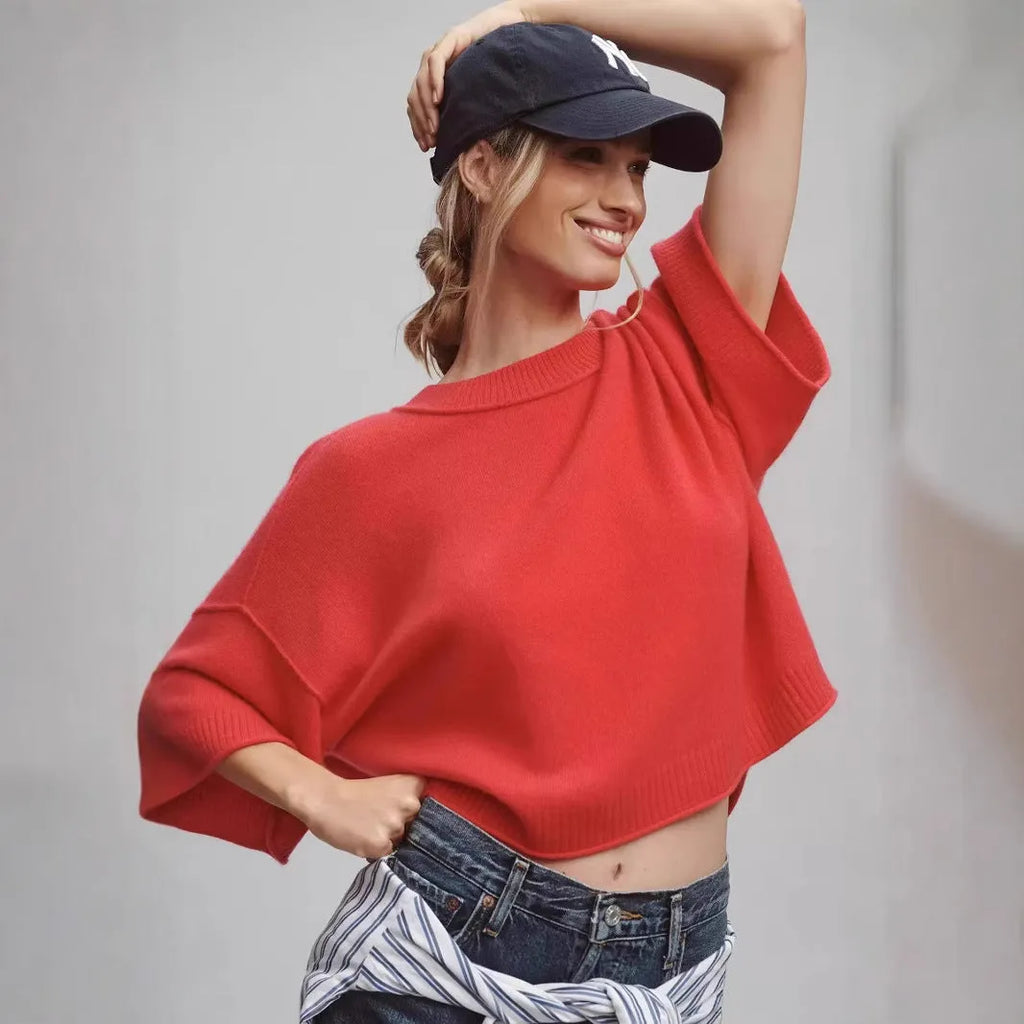 Red and white short T-shirt with an exposed navel design, made from viscose fibre.