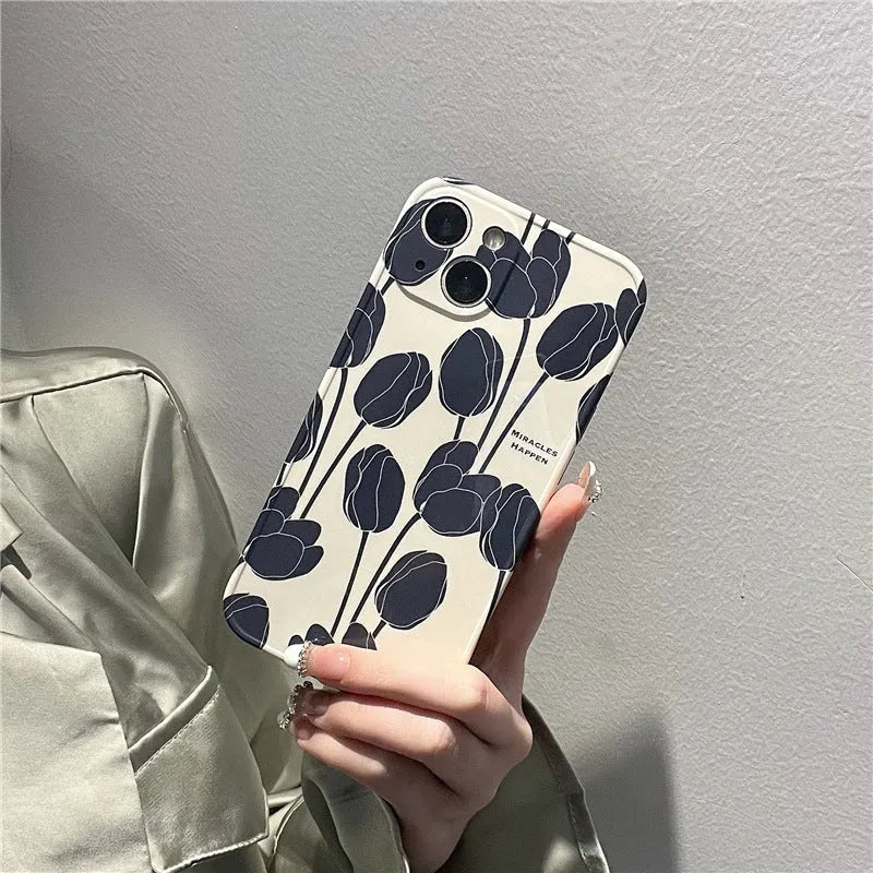 Black silicone iPhone case with tulip design for iPhone 13, 12, 11, X, and 7/8 Plus models