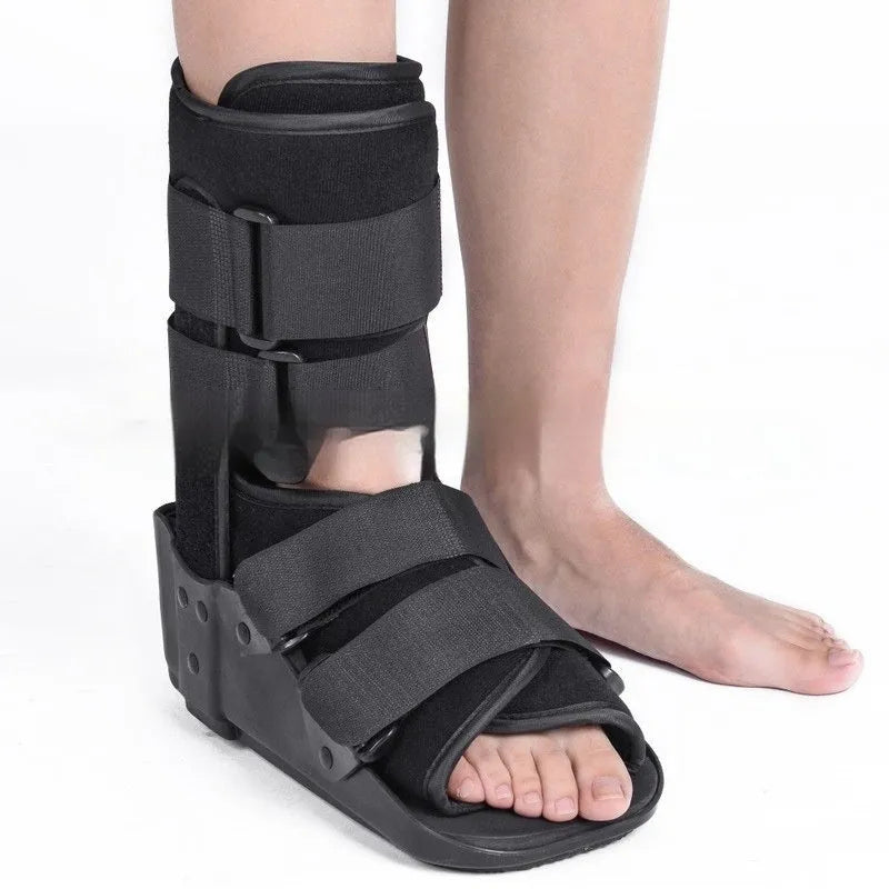 Achilles tendon rehabilitation walking boots in grey and black colours with adjustable straps