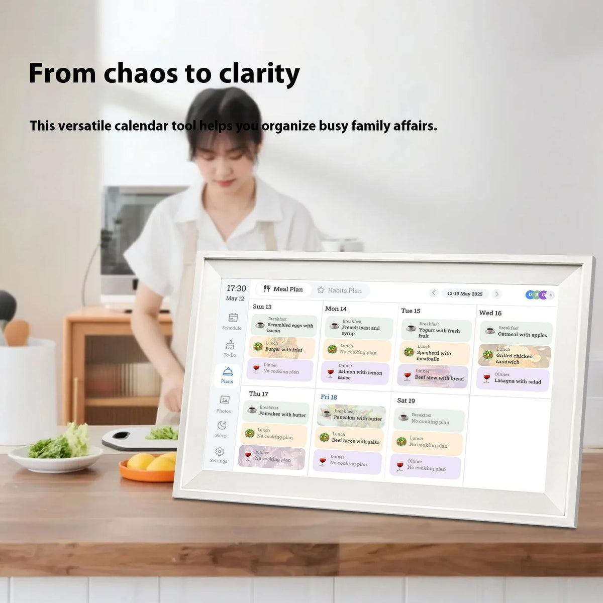 White 15.6 inch smart digital photo frame with Full HD screen on a table