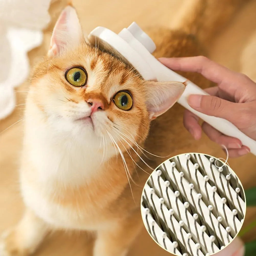Blue self-cleaning pet brush with rubber handle and metal pins for removing loose cat and dog hair.