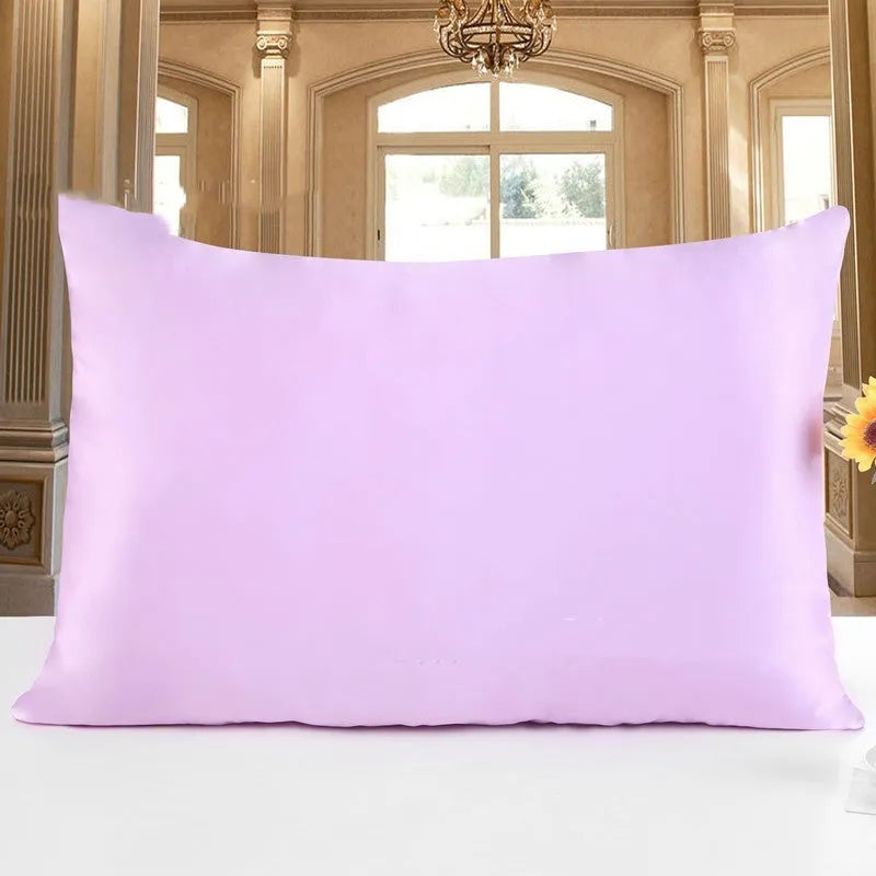 19 M double-sided silk pillowcase shown in apricot colour, lying flat to show envelope closure.