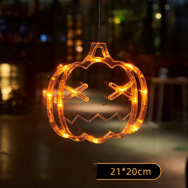 Halloween window hanging LED lights set with spider, pumpkin and ghost designs using battery power