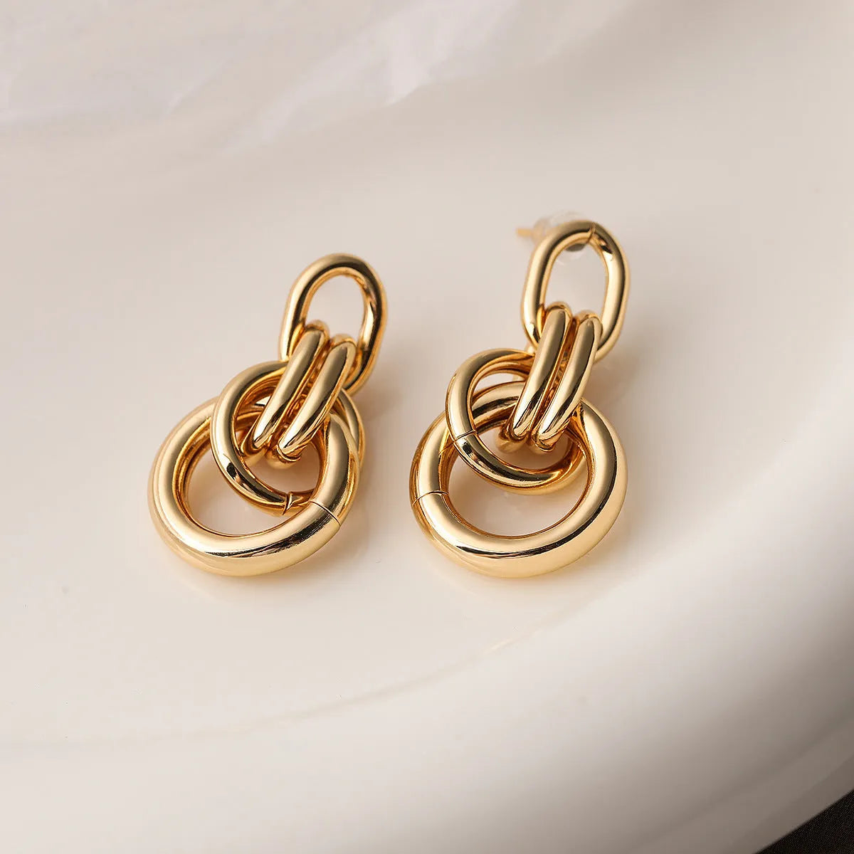 Gold geometric earrings with irregular shape and 20mm drop length for women