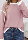 Drop shoulder loose knit top with four leaf clover contrast colour trim in polyester-elastane fabric