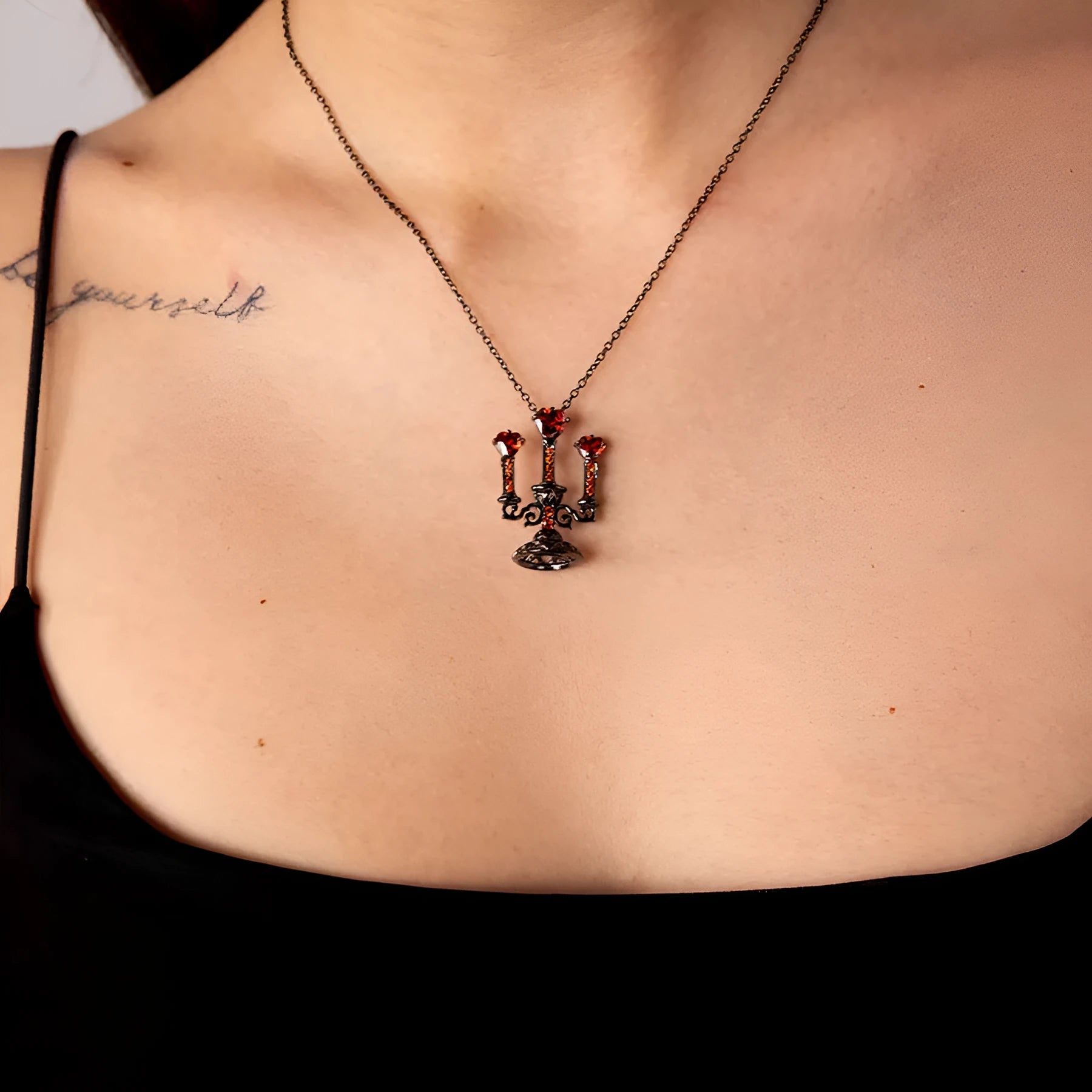 Gothic style zinc alloy clavicle chain necklace with a hollow candlestick pendant in a retro colour finish.