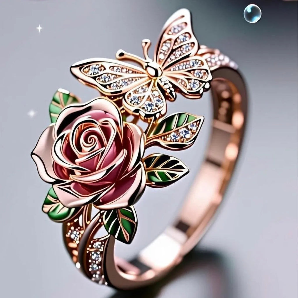 Colourful oil treatment fairy style ring with adjustable alloy construction showing flower, insect and leaf modelling