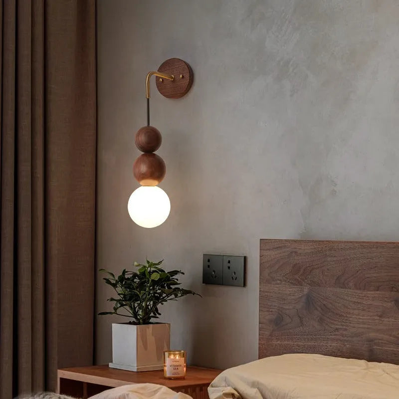Wood and copper wall lamp with circular shade for living room or bedroom lighting