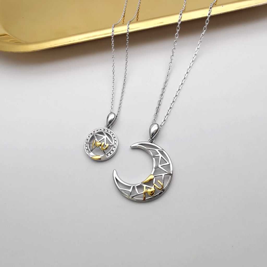 Sun Moon Tooth Couple Necklace showing electroplated copper pendant with cross chain