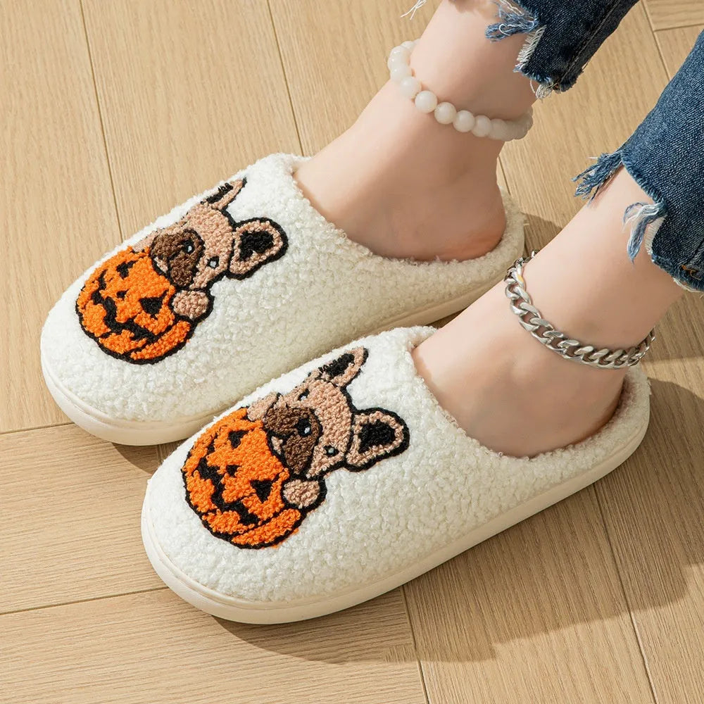 Halloween pumpkin design plush slippers with black velvet upper and TPR rubber sole.
