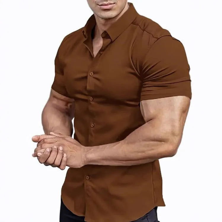 Man wearing a brown short sleeve printed casual shirt with a shirt collar.