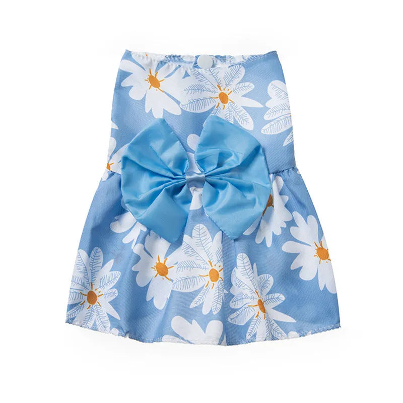 Orange bow summer pet dress with floral butterfly pattern on a dog, showing princess-style thin polyester construction.