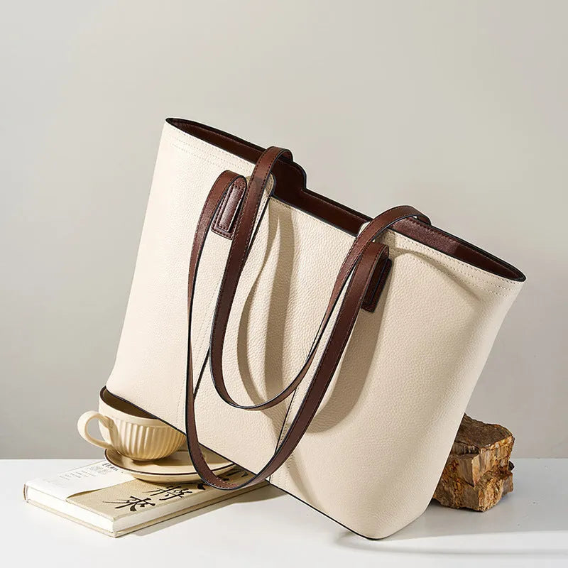 Women's genuine leather large capacity crossbody commuter bag with multiple internal compartments