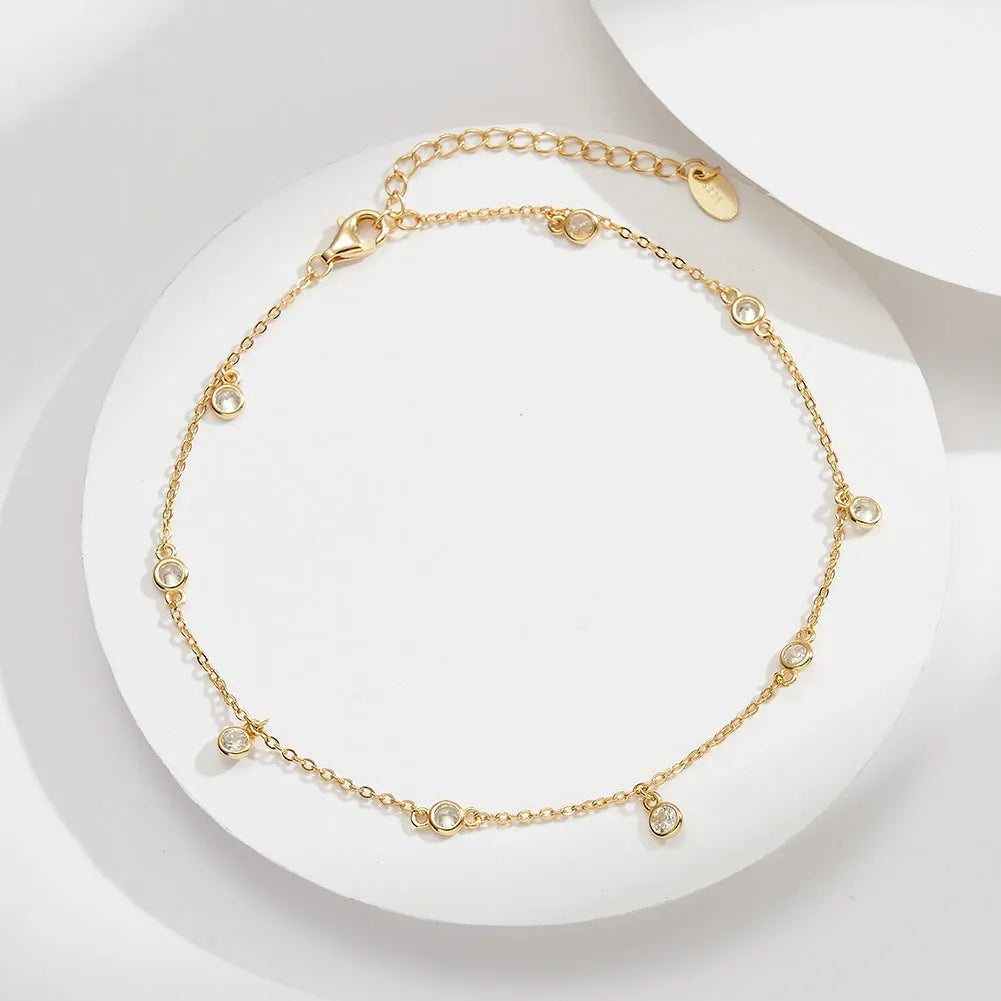 Silver women's anklet with geometric pendant and zirconium details in gold or white gold finish