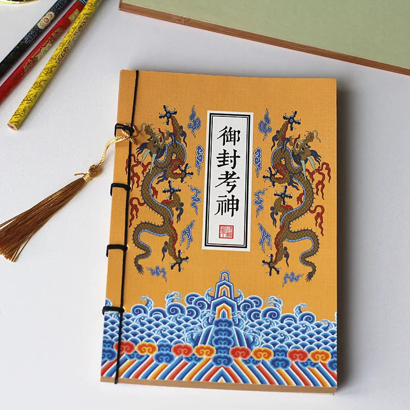 A5 antique wire-bound notebook with glossy embossed cover featuring a retro painting design, shown open.