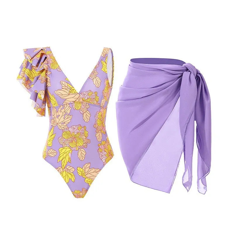Women's solid colour one-piece swimsuit with spaghetti straps and attached skirt in polyester fabric