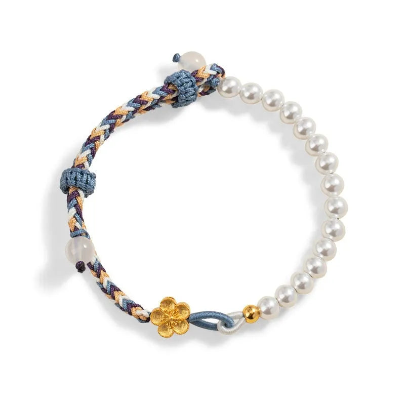 Peach coloured carrying strap bracelet with Chinese flower weaving pattern featuring sterling silver chalcedony and pearl decorative elements